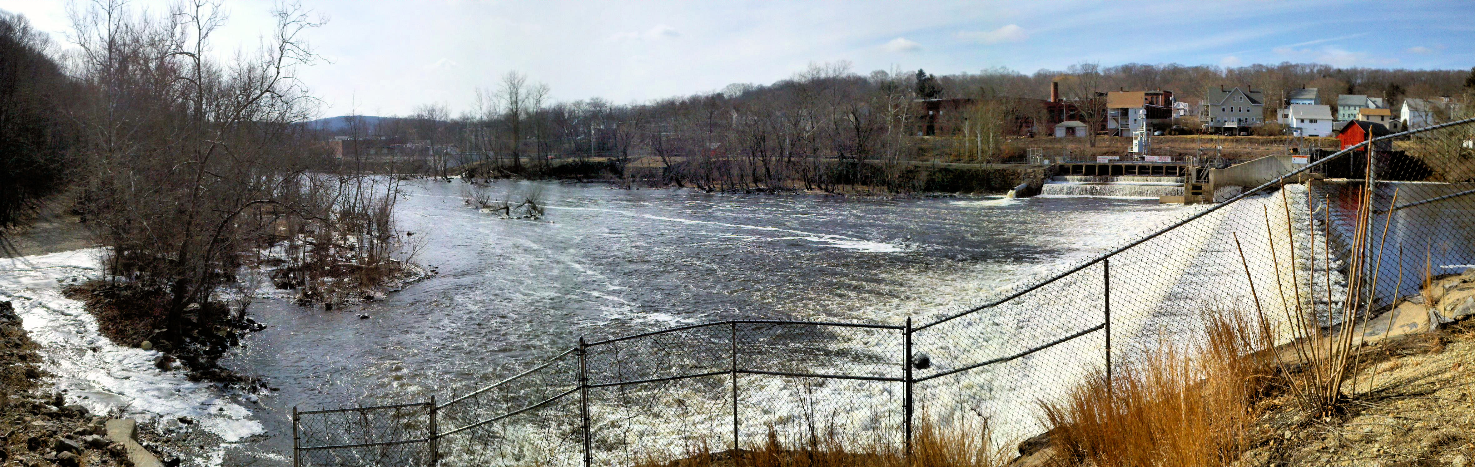 A view from the far shore at the Greeneville Dam down the Shetucket River to the Norwich Harbor.